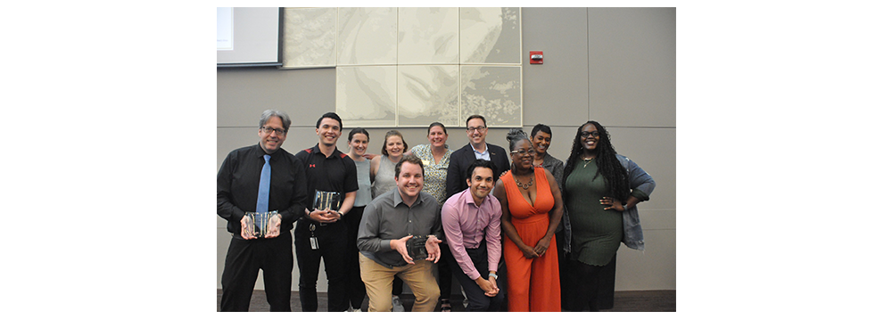 A group of staff members including Nick Jones (far left), member of ITS, receiving the Staff Member Of The Year award. A group of staff members including Nick Jones (far left), member of ITS, receiving the Staff Member Of The Year award.